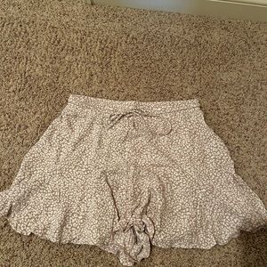 Pink and white women’s size M shorts